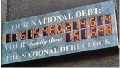 OUR NATIONAL DEBT: EL 605 480,204-604 YOUR Family share THE NATIONAL DEBI CLOCK