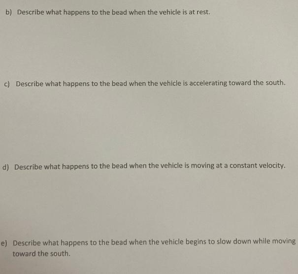 b) Describe what happens to the bead when the vehicle is at rest. c) Describe what happens to the bead when