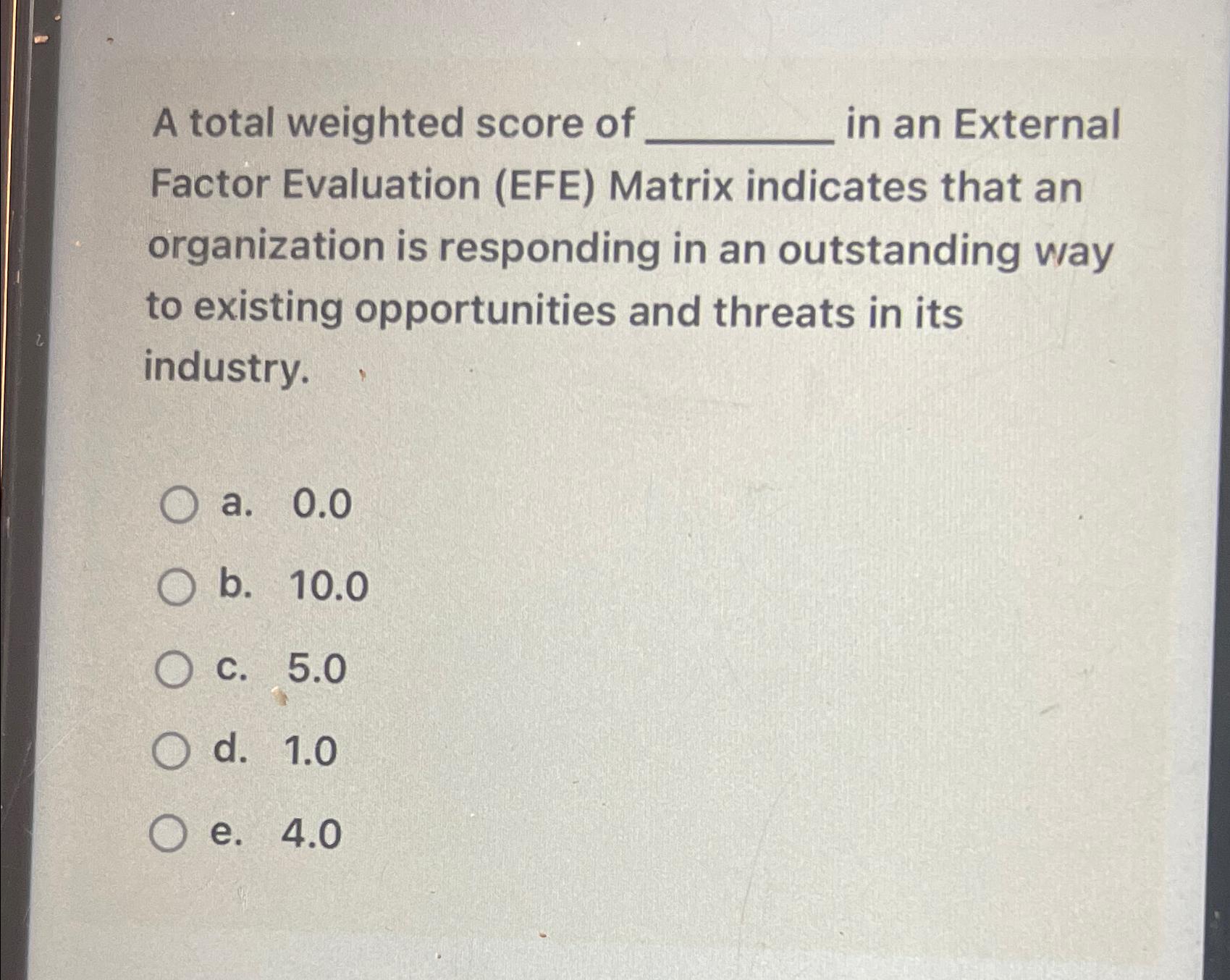 A total weighted score of in an External Factor Evaluation (EFE) Matrix indicates that an organization is