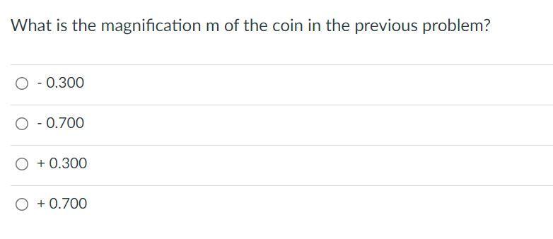 What is the magnification m of the coin in the previous problem? 0 - 0.300 0 -0.700 O + 0.300 O + 0.700