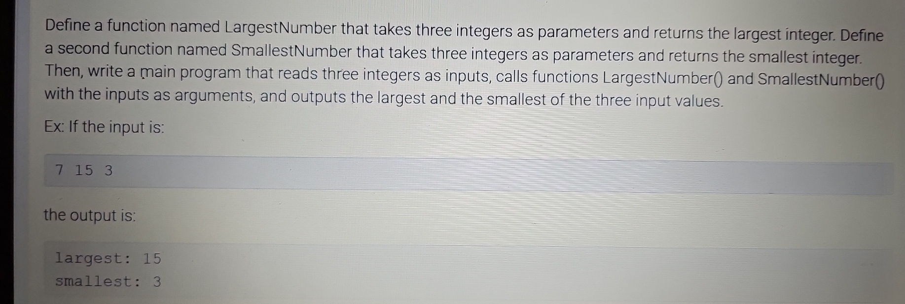  Define a function named LargestNumber that takes three integers as parameters