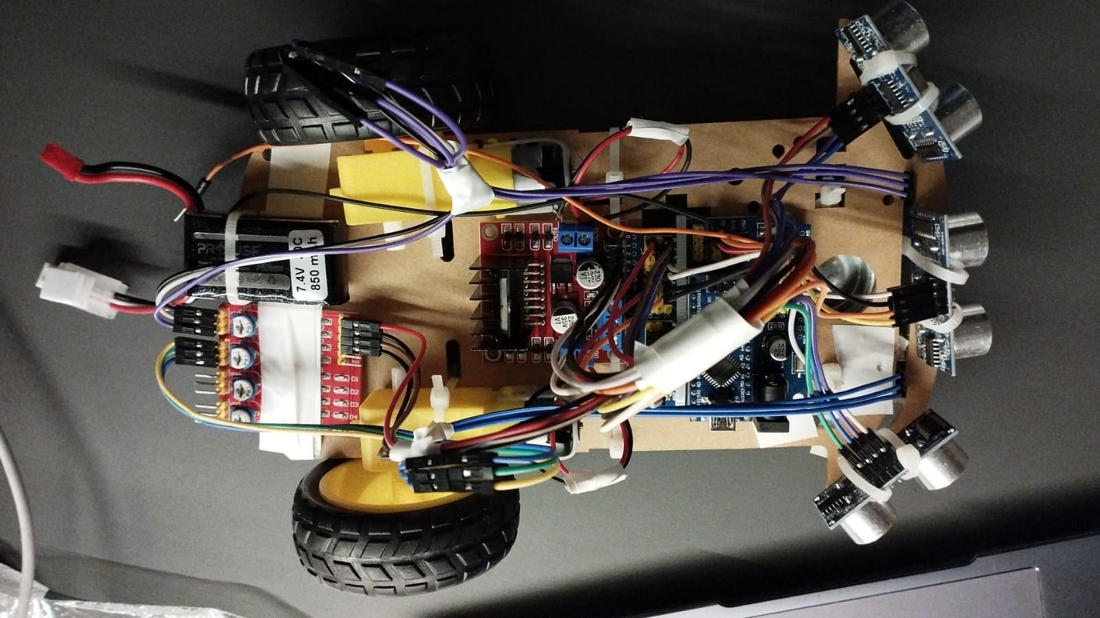 Please write code for an obstacle avoiding robot that uses Arduino nano