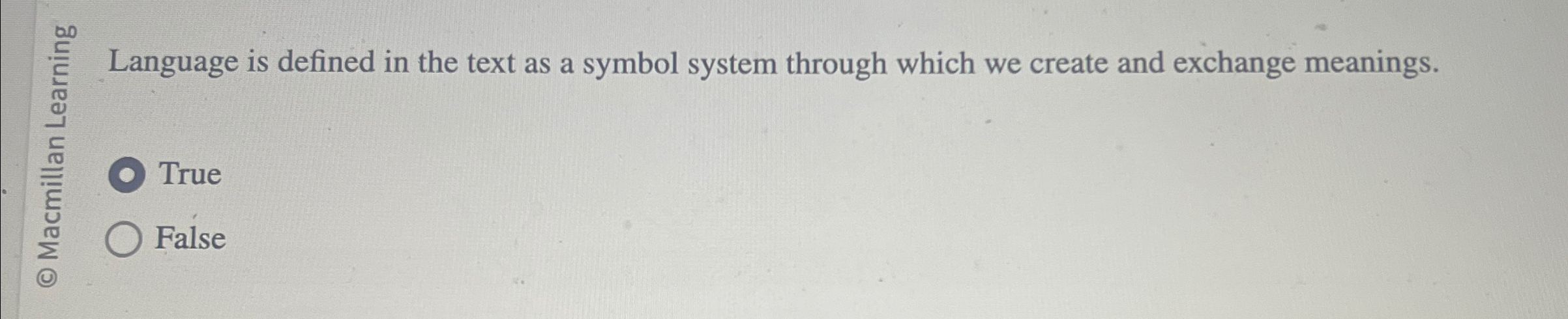  Language is defined in the text as a symbol system through