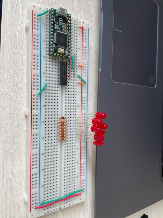This is an Arduino program, which uses the shift register to control