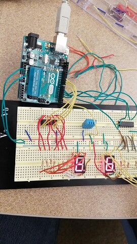 Write a program using the Arduino Uno to display a temperature