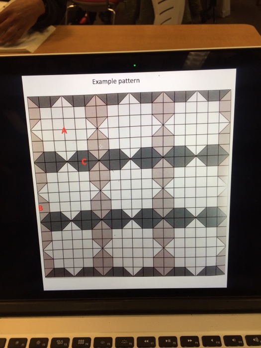 shape & has 2 or 3 colors. The background square grid is