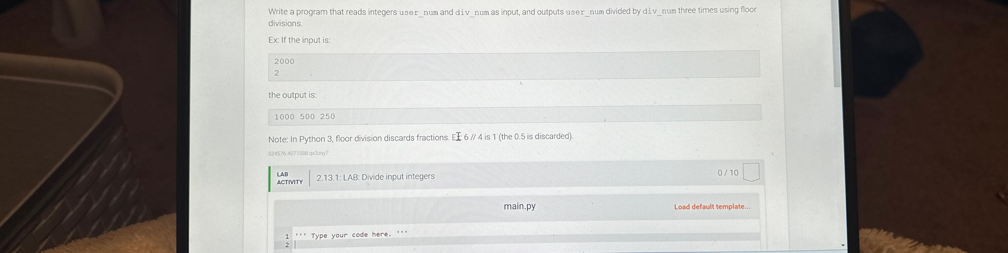 Write a program that reads integers user_num and div_num as input,
