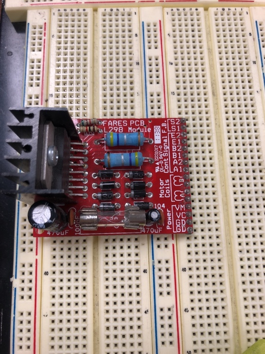  Write a code that controls Dc motor movement clockwise and counterclockwise