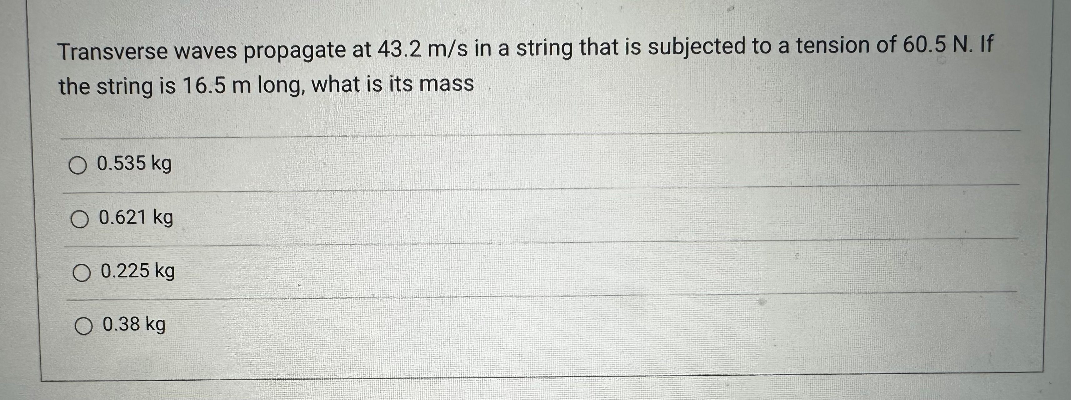 Transverse waves propagate at 43.2 m/s in a string that is
