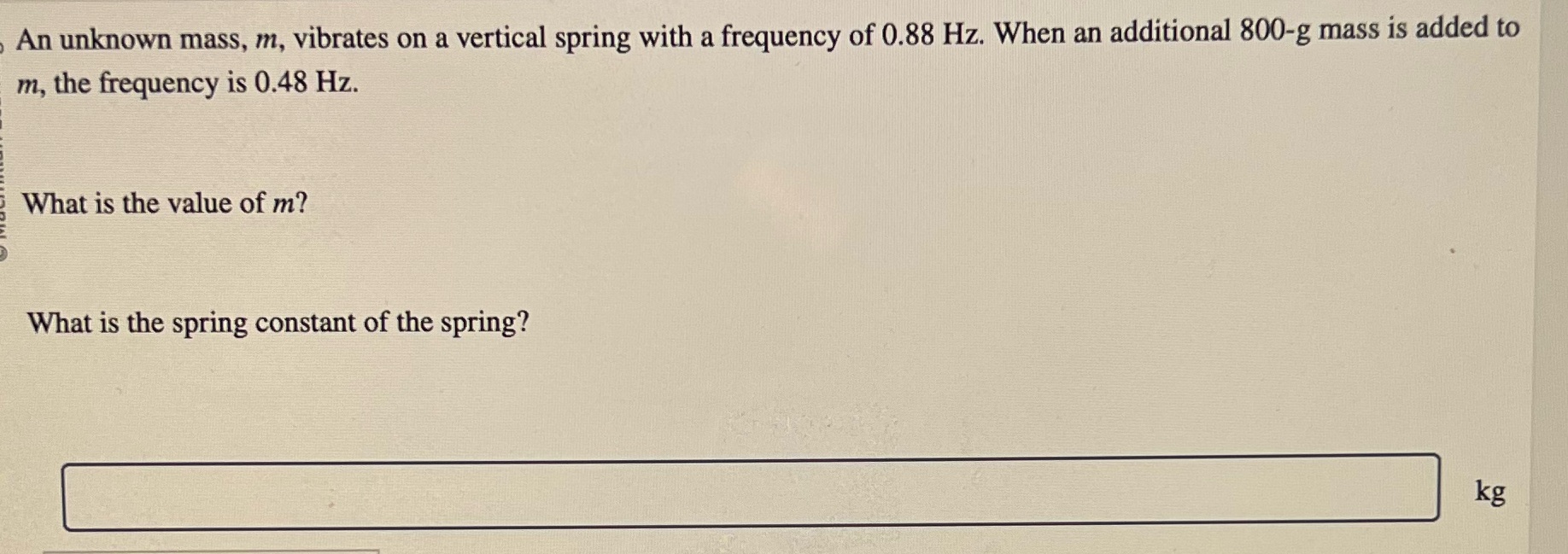 An unknown mass, m, vibrates on a vertical spring with a