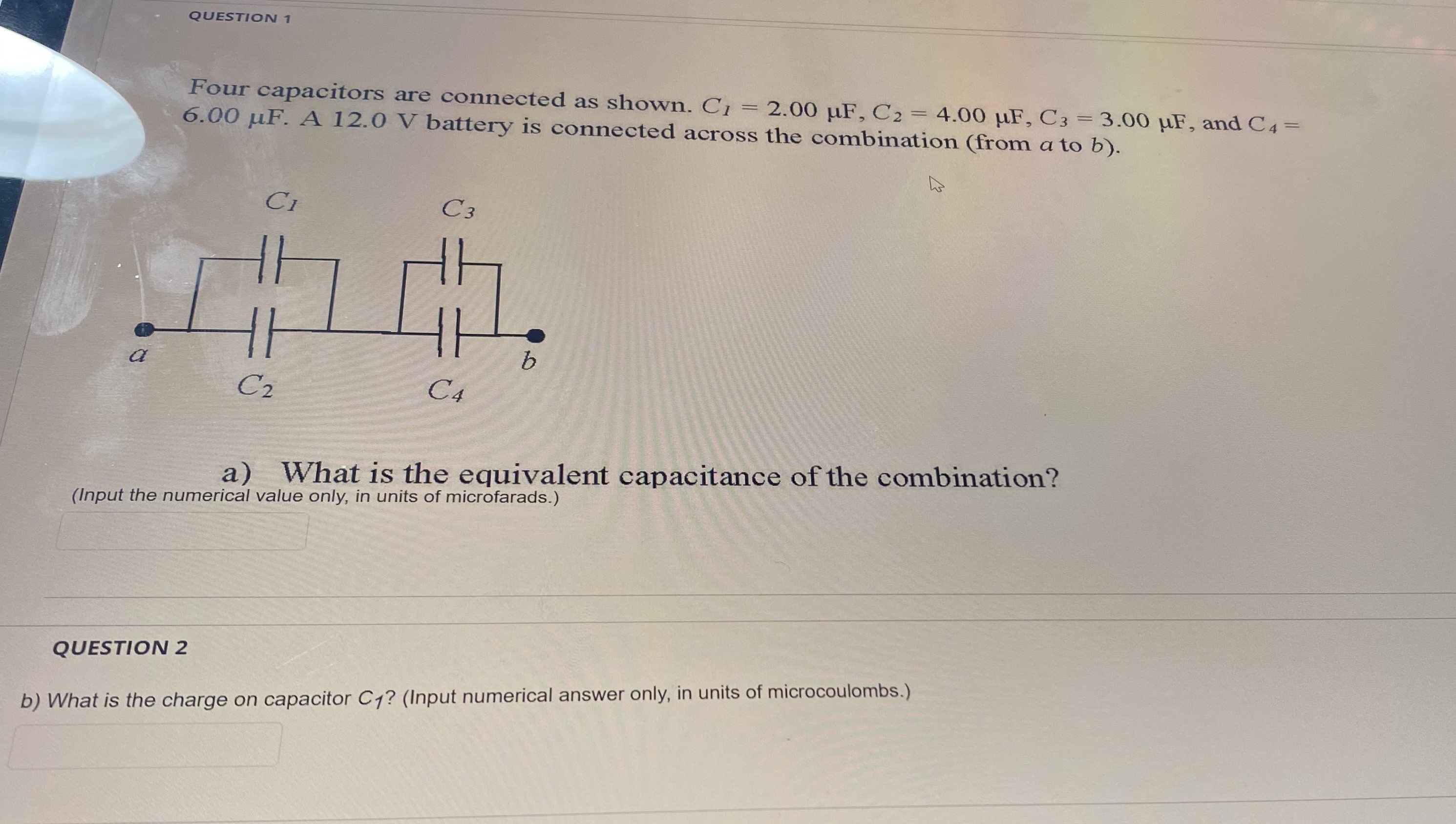 QUESTION 1 Four capacitors are connected as shown. C1 = 2.00