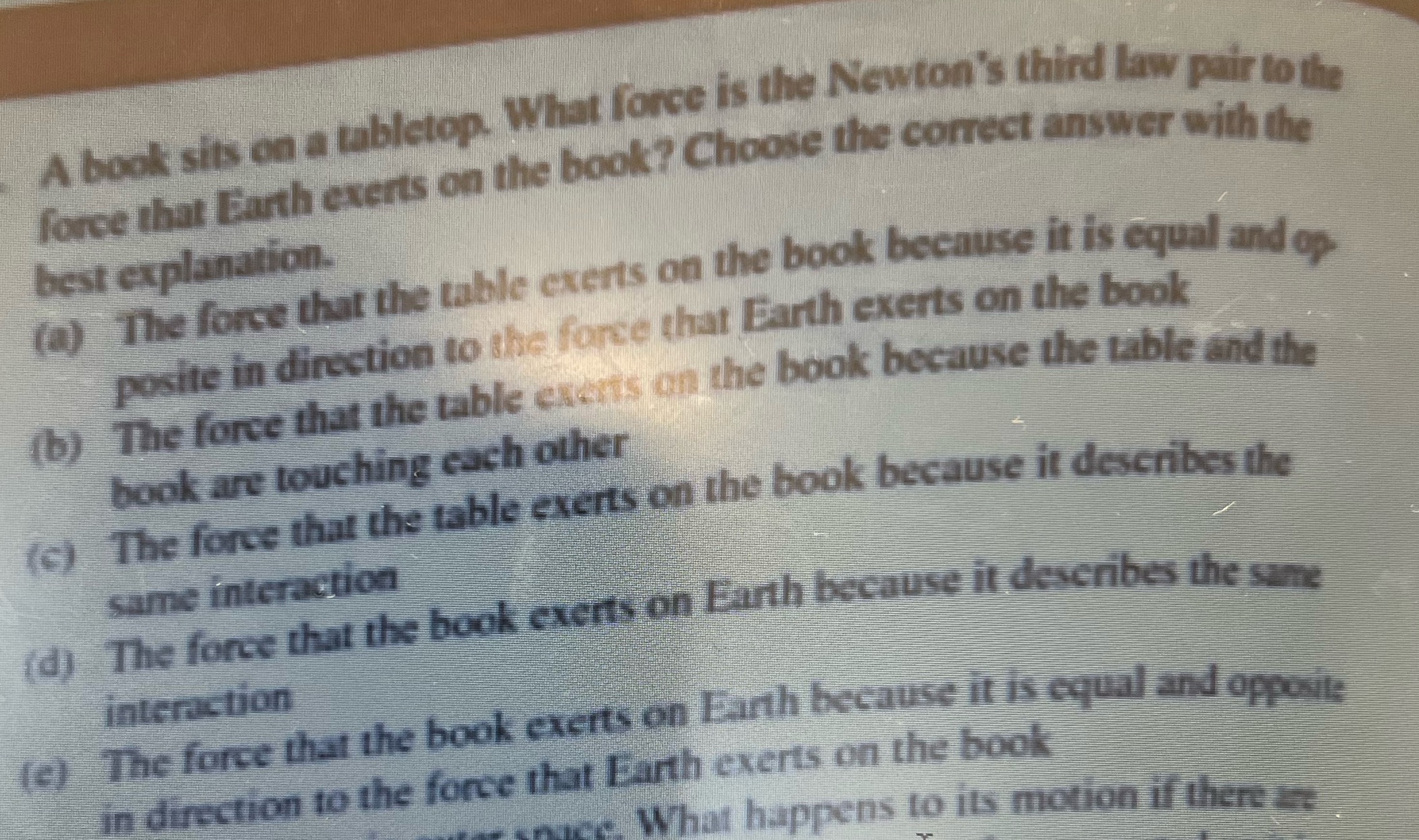  A book sits on a tabletop. What force is the Newton's