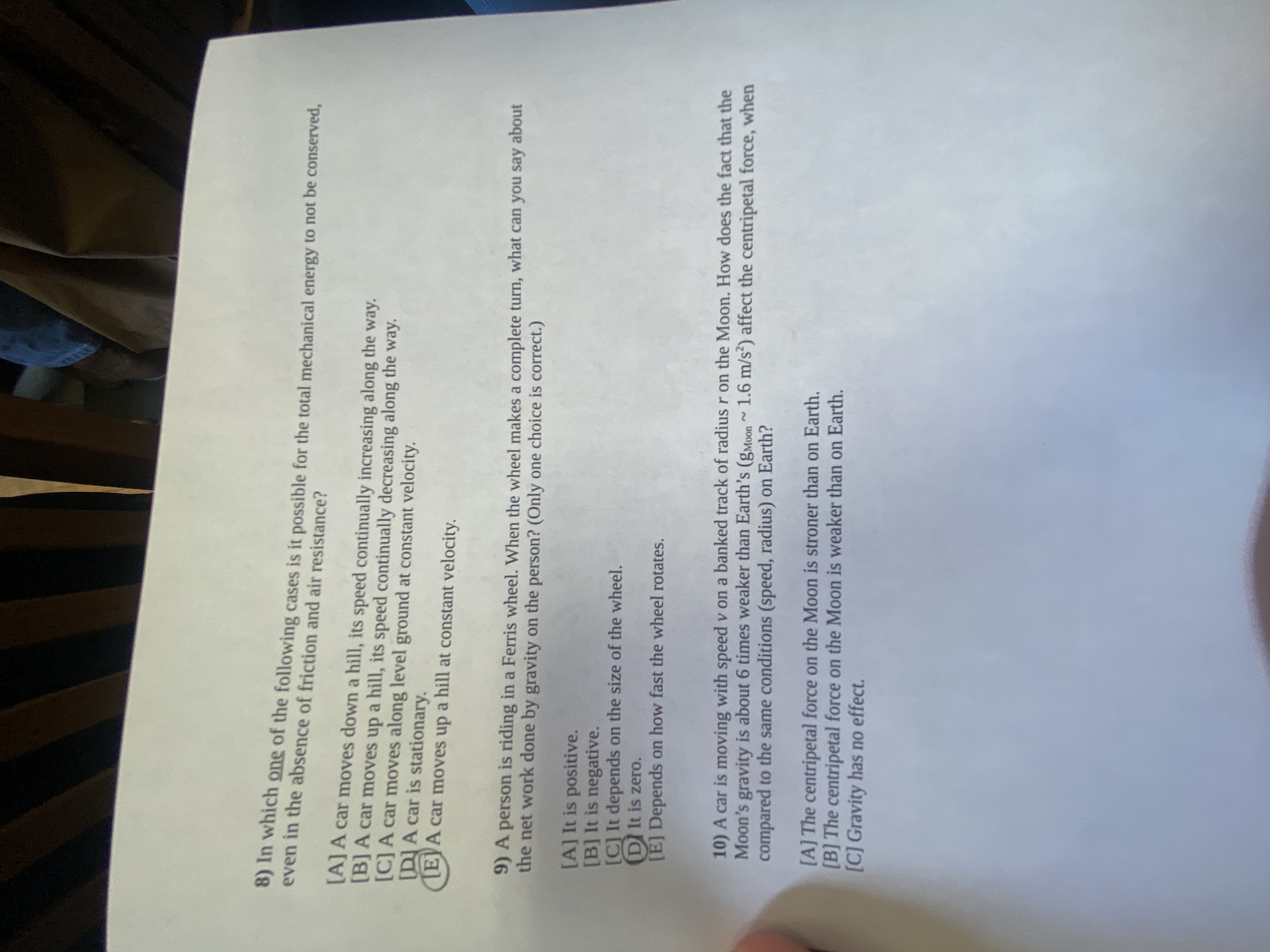 1) The tangential speed and centripetal acceleration of a car going through