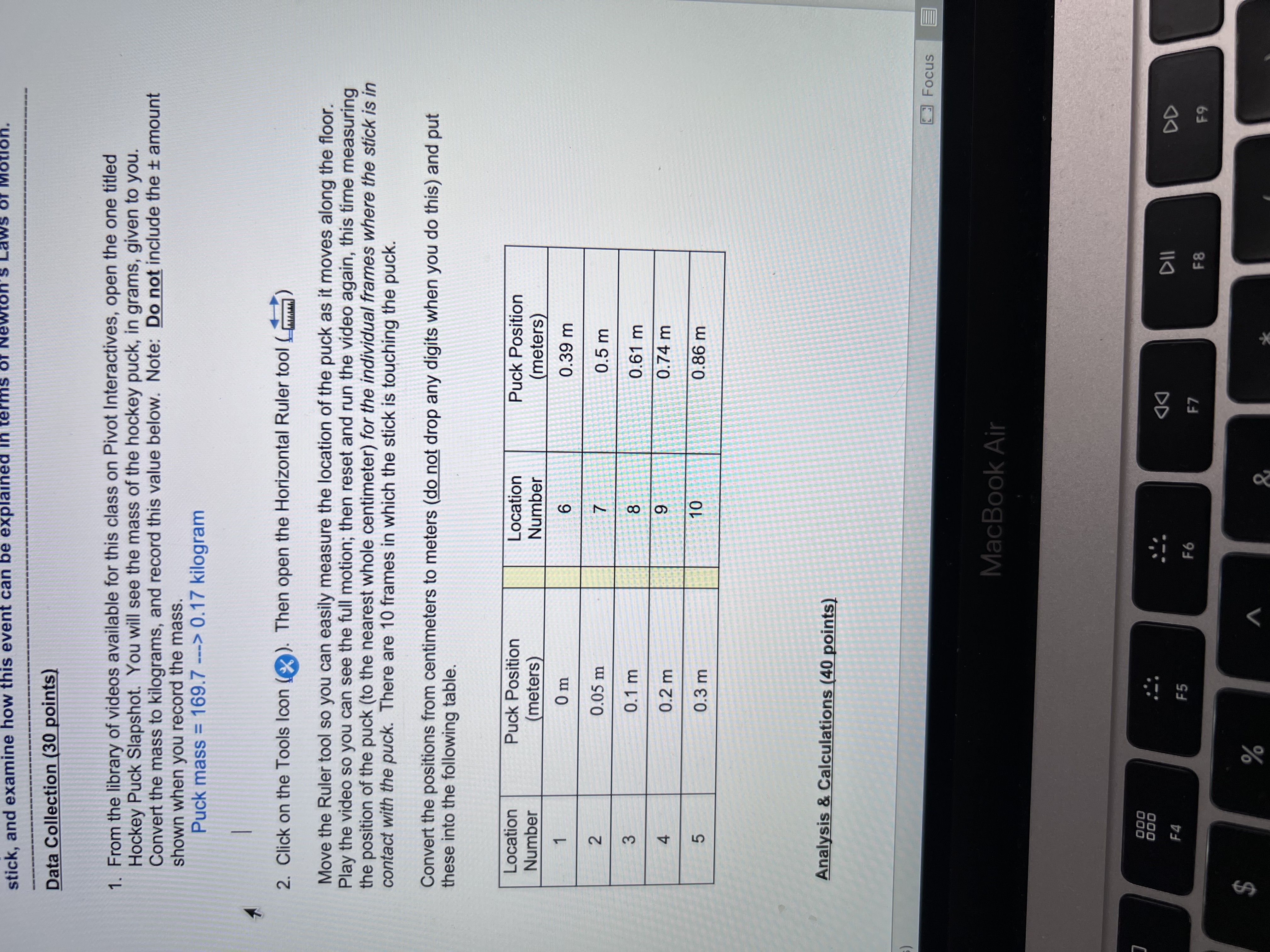 the velocity of the puck between points 1 and 2 (it turns