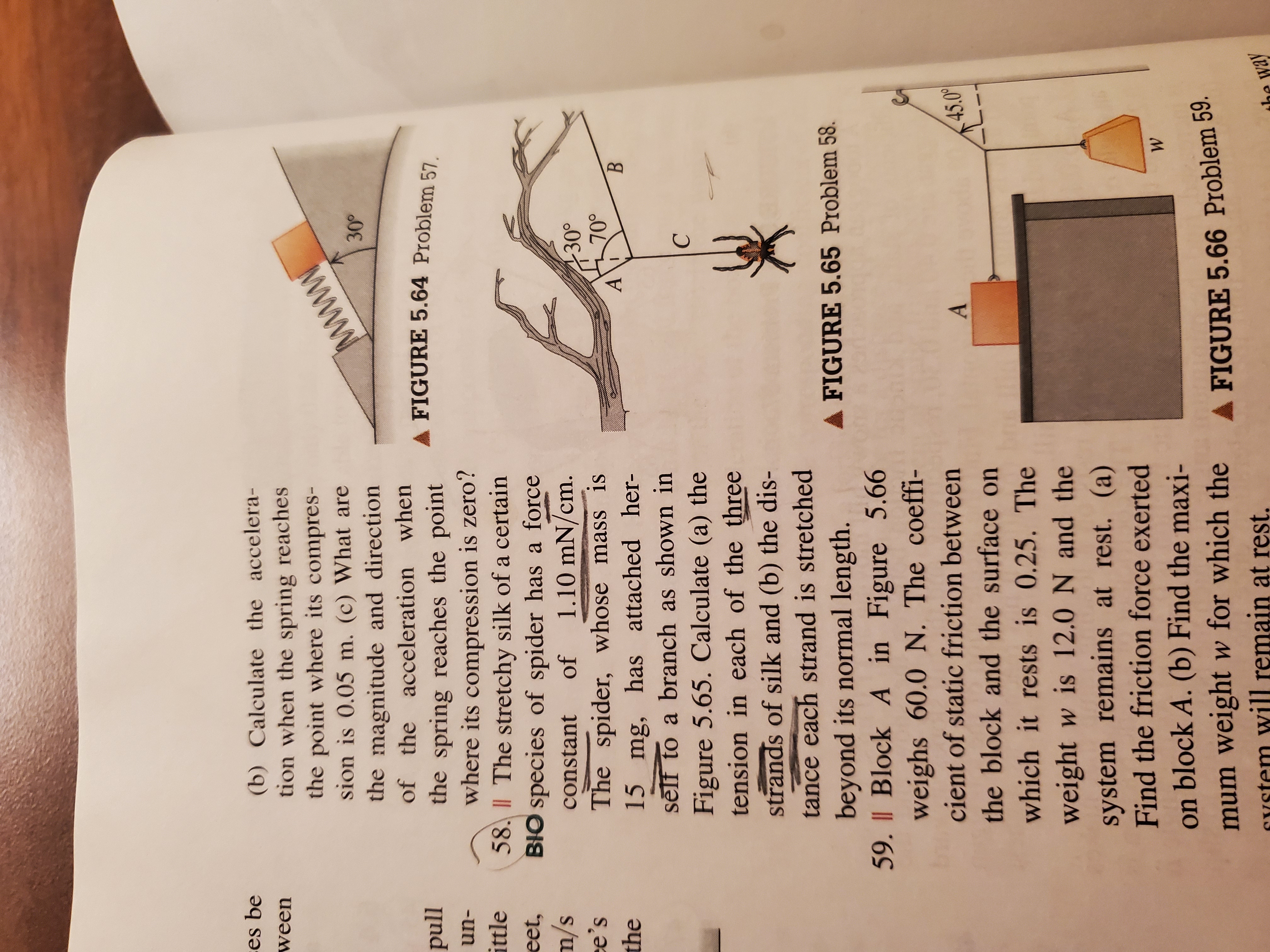 es be (b) Calculate the accelera- ween tion when the spring