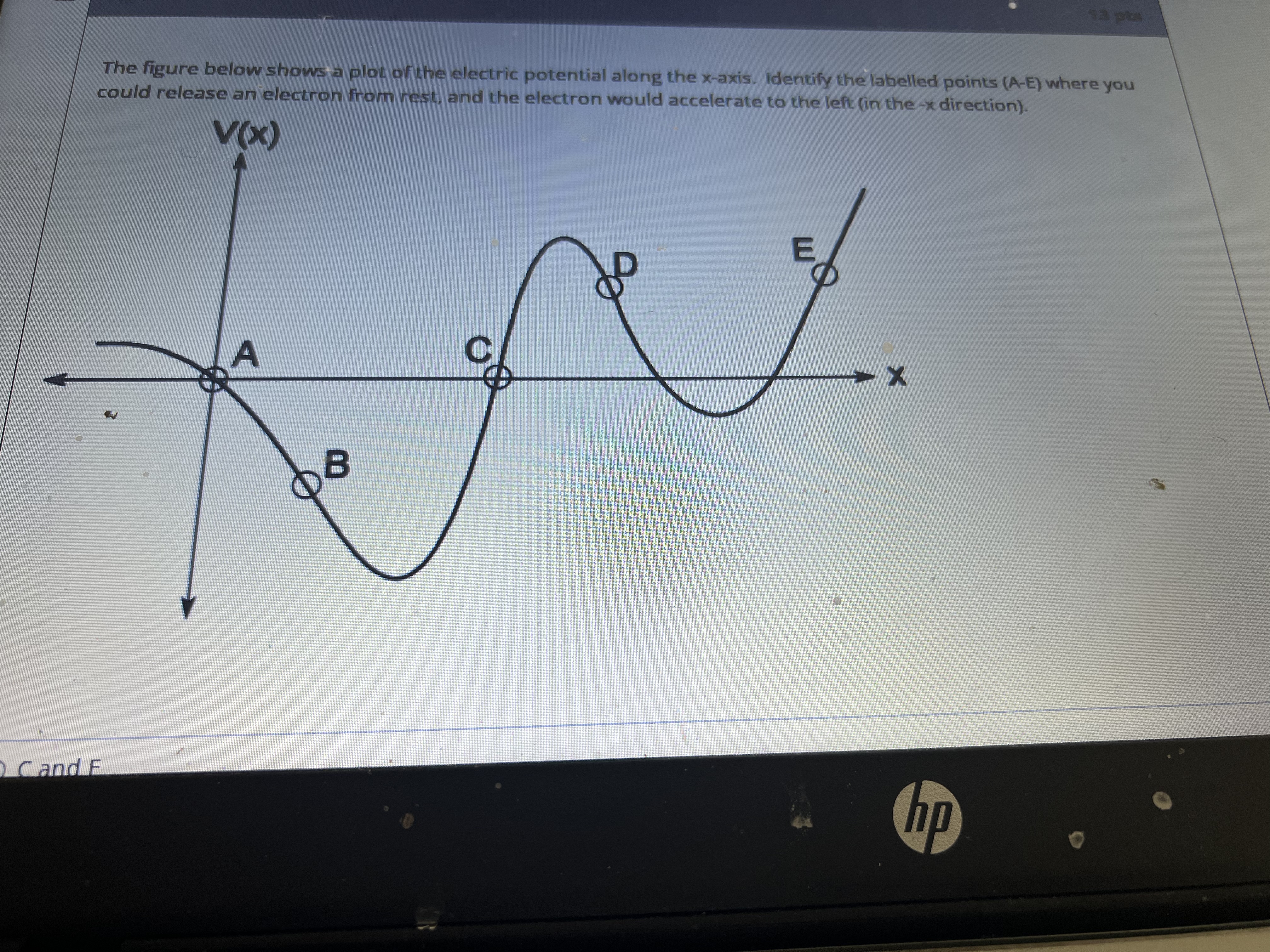 with charge +2.53 nc and mass 1.65 x 10-10 kg is held