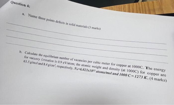  a. Name three points defects in solid materials ( 3 marks)