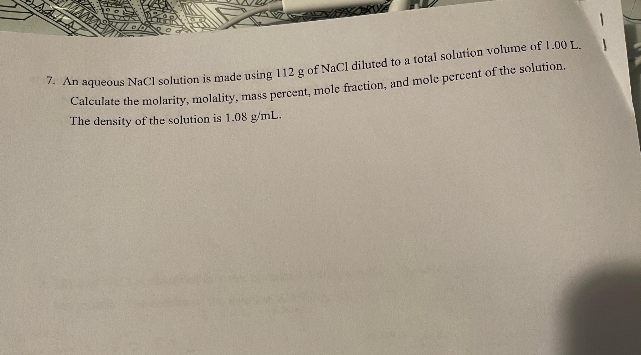  An aqueous NaCl solution is made using 112g of NaCl diluted