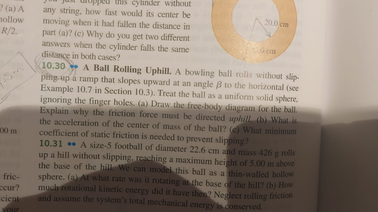  ?(a) A any string, how fast would its center be moving