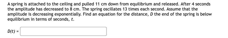  A spring is attached to the ceiling and pulled 11 cm
