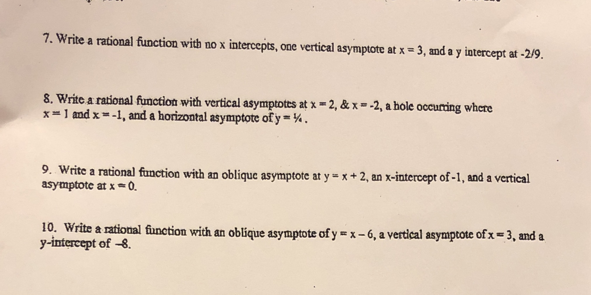  7. Write a rational function with no x intercepts, one vertical