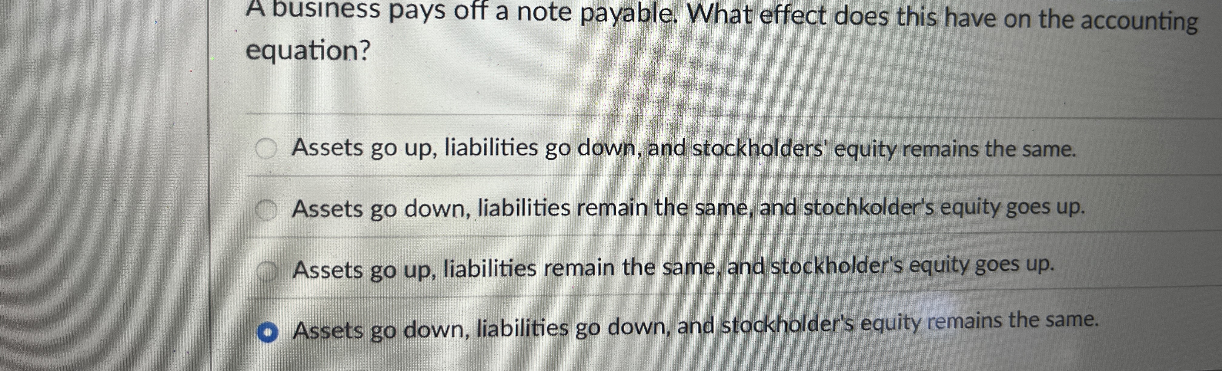  A business pays off a note payable. What effect does this