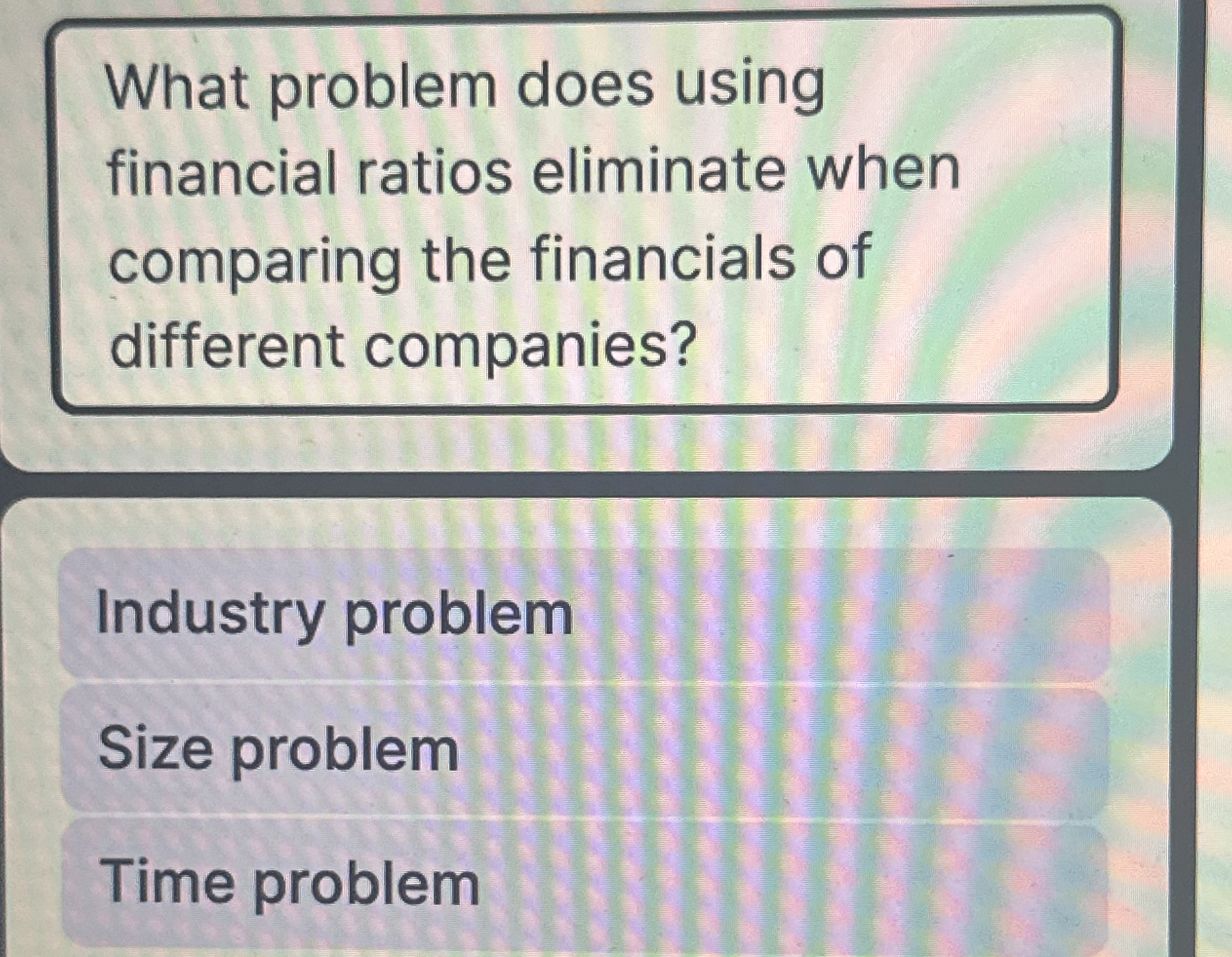  What problem does using financial ratios eliminate when comparing the financials