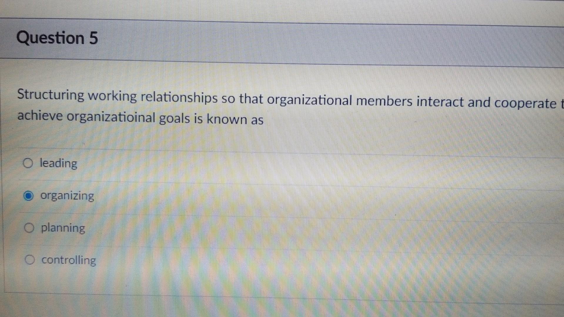  Structuring working relationships so that organizational members interact and cooperate achieve