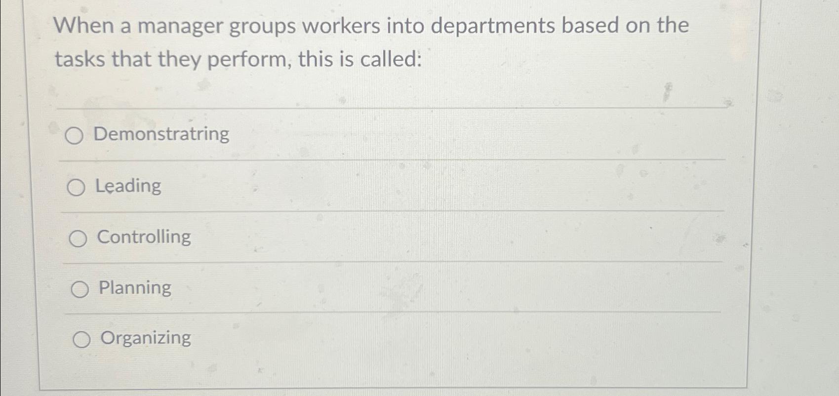  When a manager groups workers into departments based on the tasks