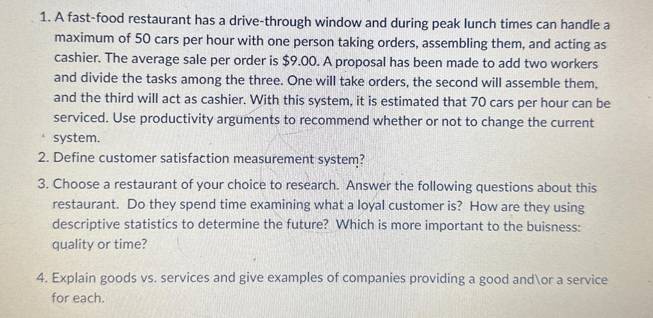  A fast-food restaurant has a drive-through window and during peak lunch