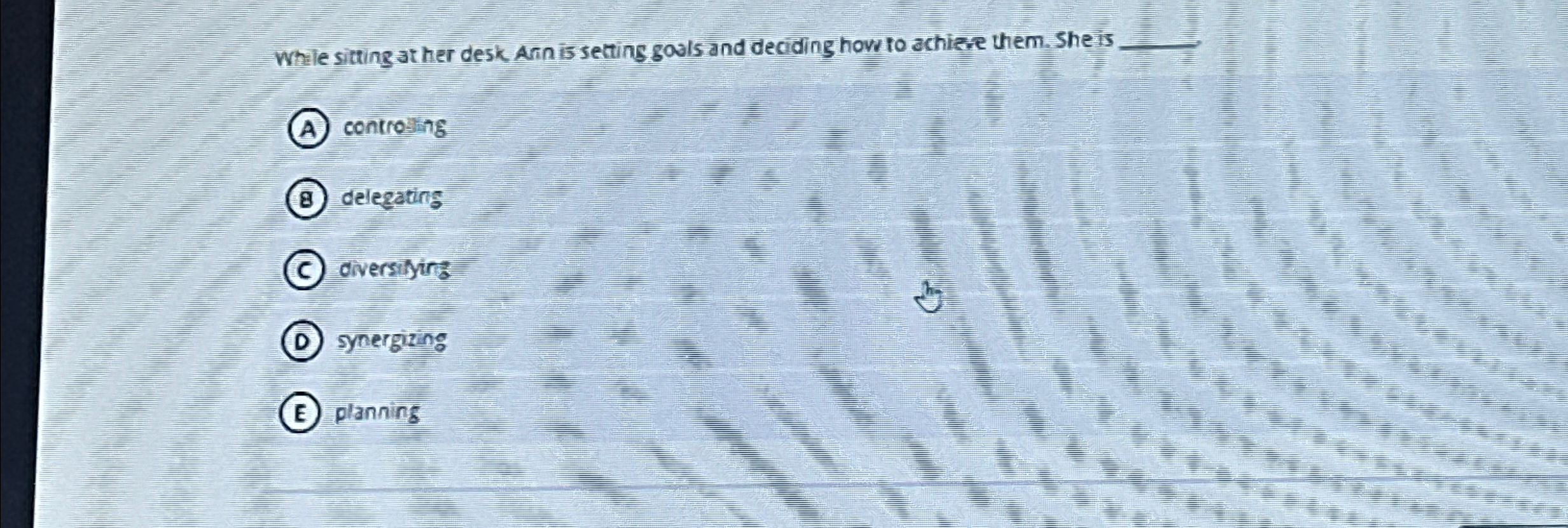  While sitting at her desk Atn is setting goals and deciding