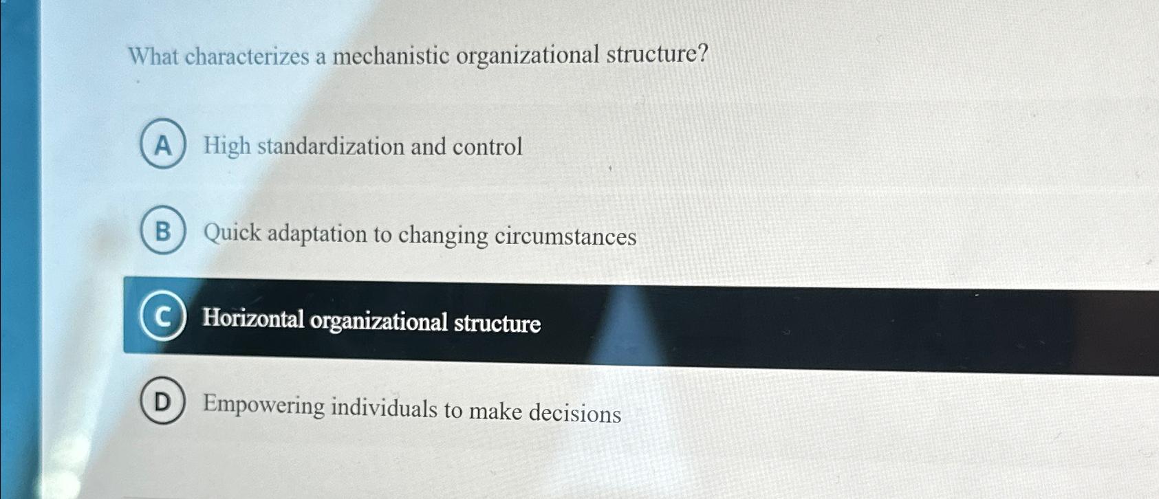  What characterizes a mechanistic organizational structure? High standardization and control Quick