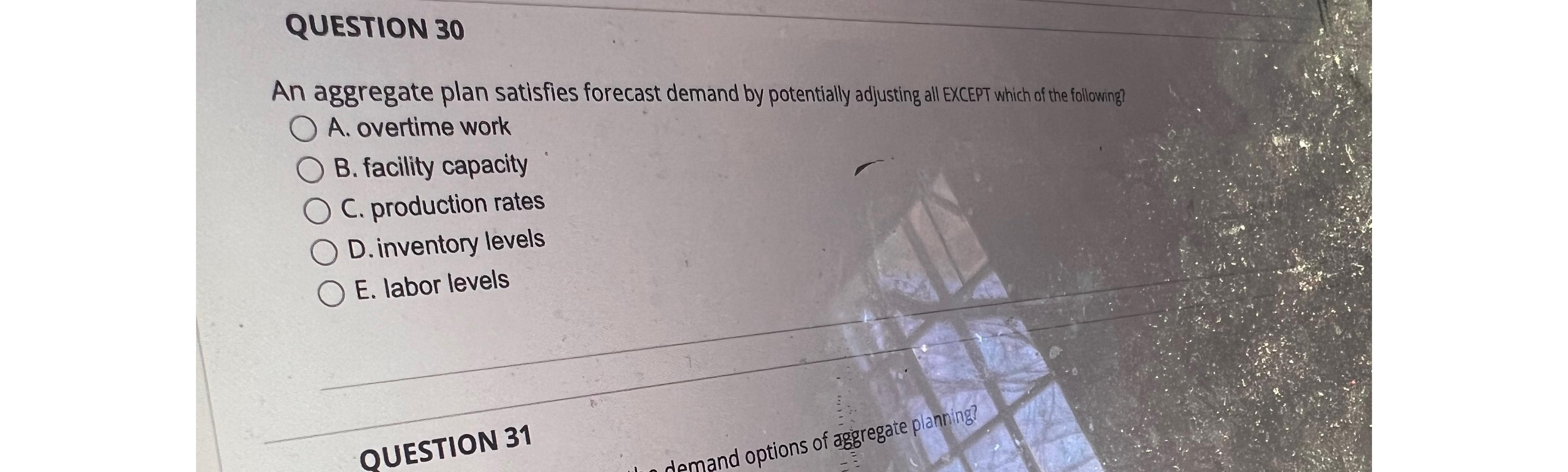  QUESTION 30 An aggregate plan satisfies forecast demand by potentially adjusting