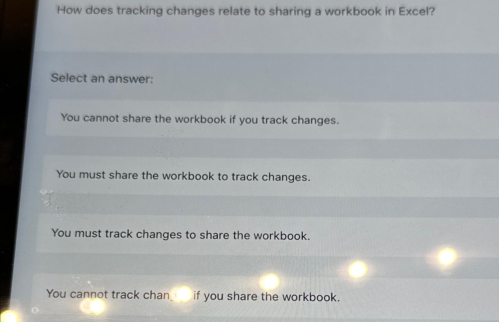  How does tracking changes relate to sharing a workbook in Excel?