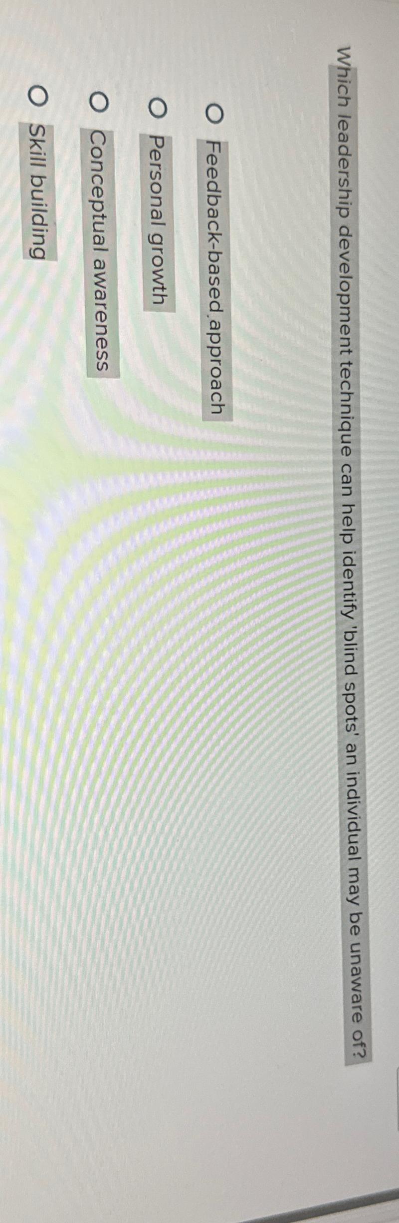  Which leadership development technique can help identify 'blind spots' an individual