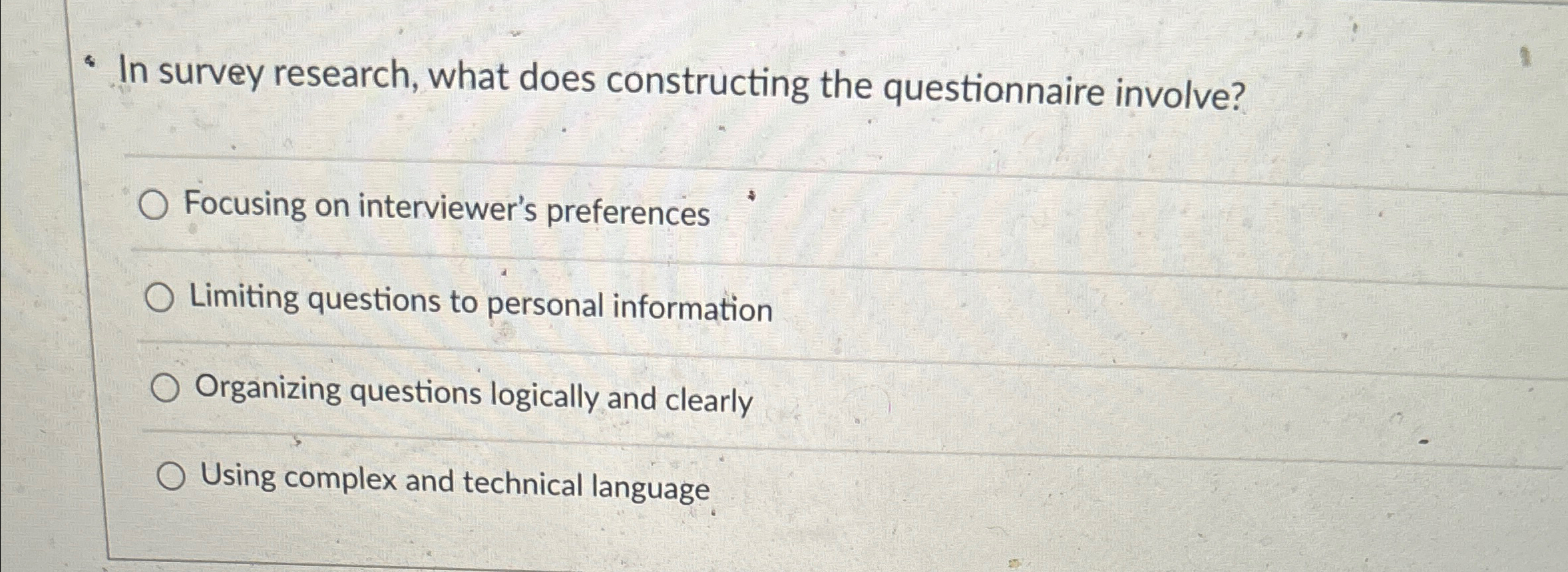  In survey research, what does constructing the questionnaire involve? Focusing on