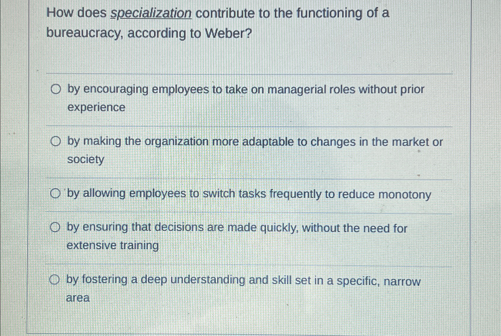  How does specialization contribute to the functioning of a bureaucracy, according