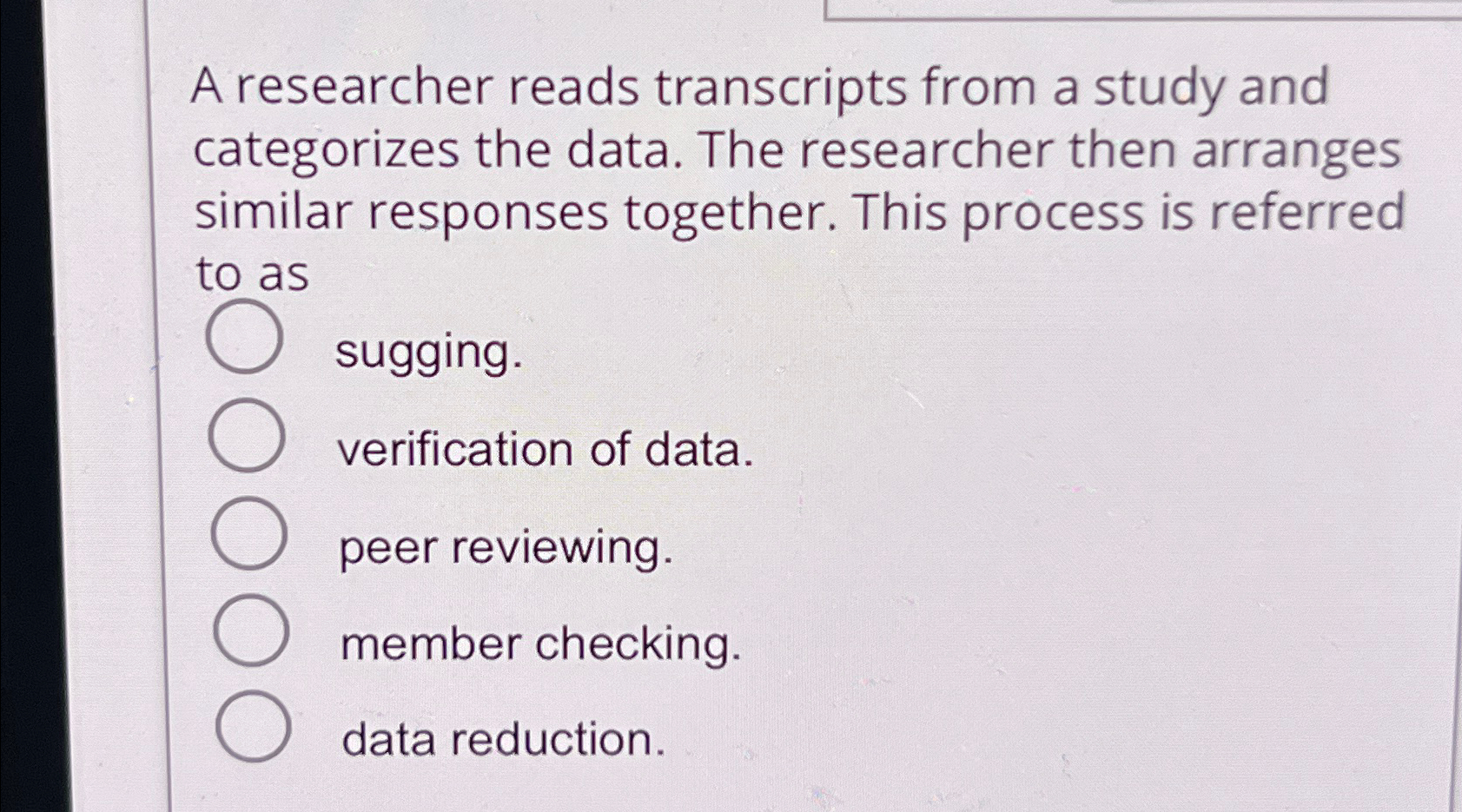  A researcher reads transcripts from a study and categorizes the data.