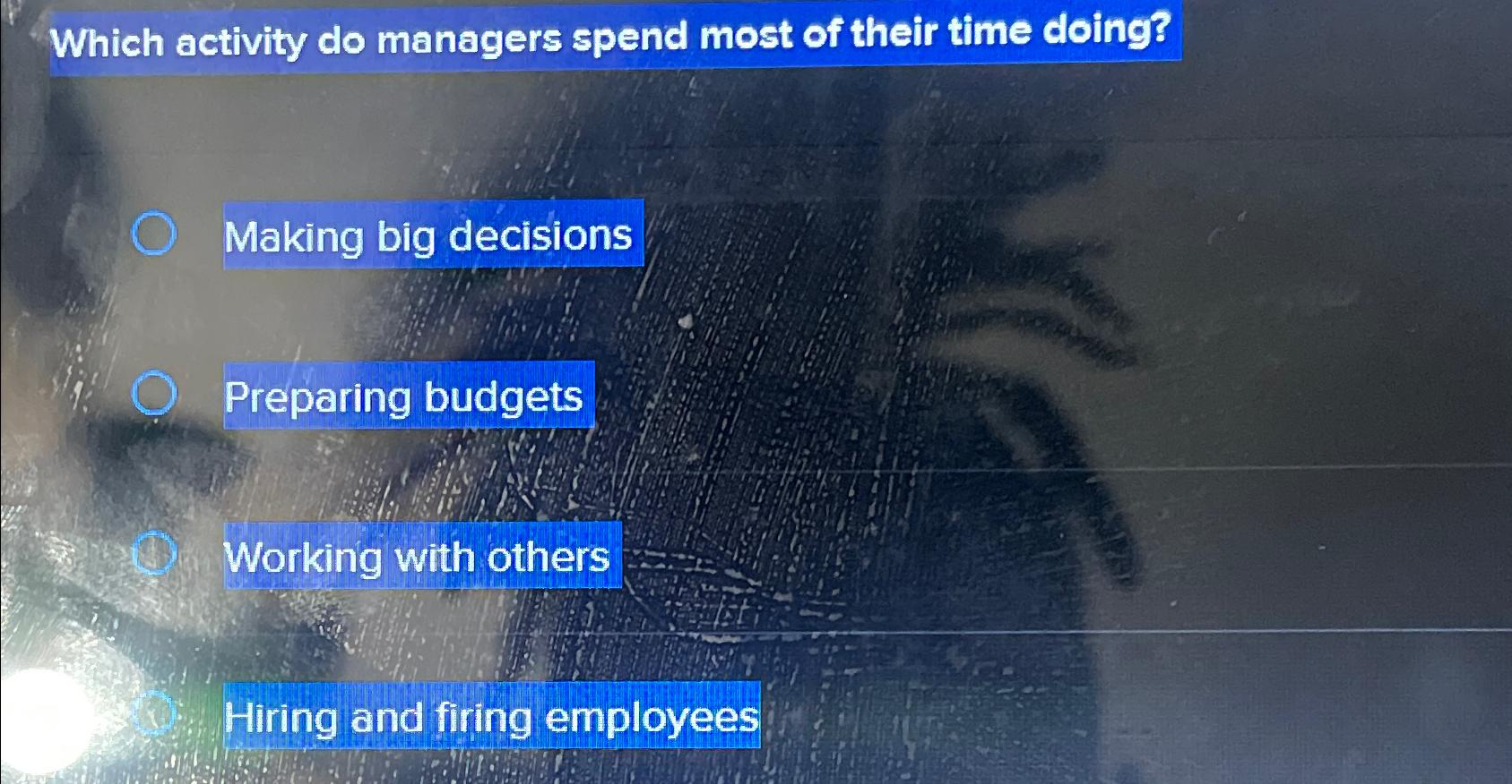  Which activity do managers spend most of their time doing? Making