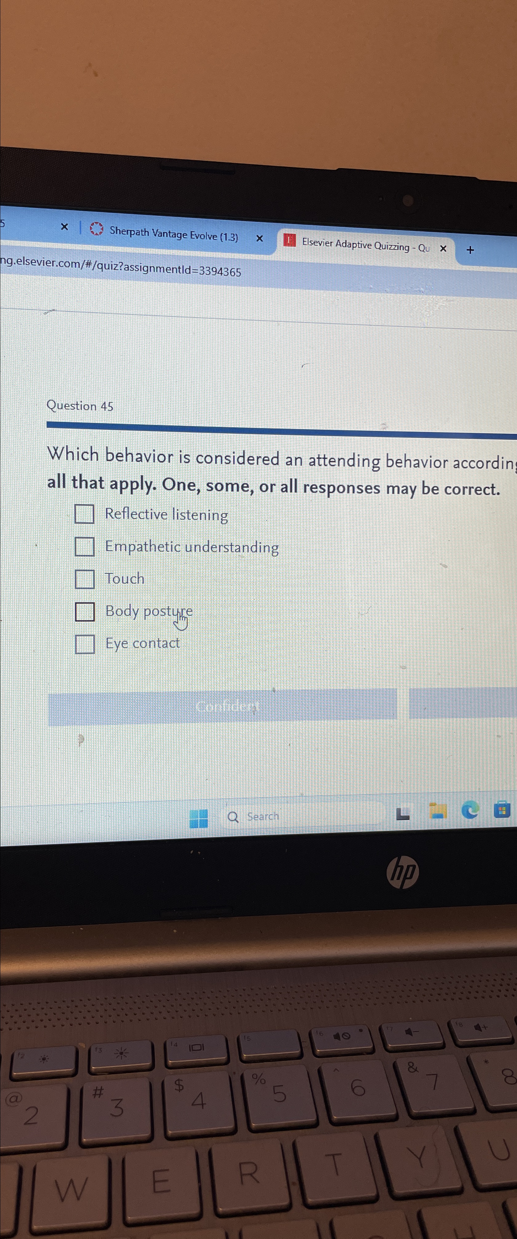  Question 45 Which behavior is considered an attending behavior accordin all