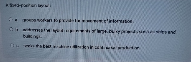  A fixed-position layout: a. groups workers to provide for movement of