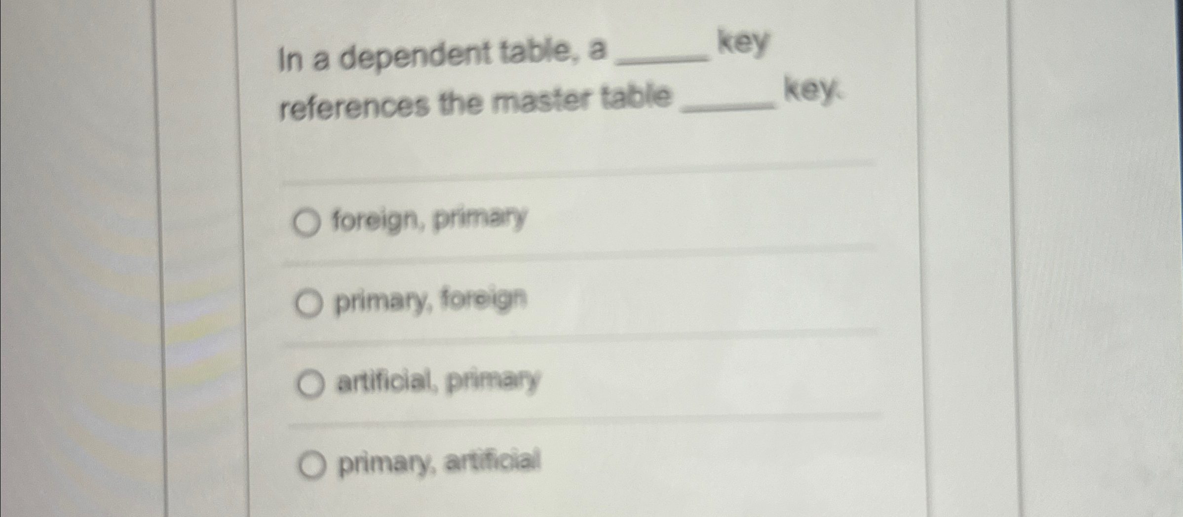 In a dependent table, a key references the master table key