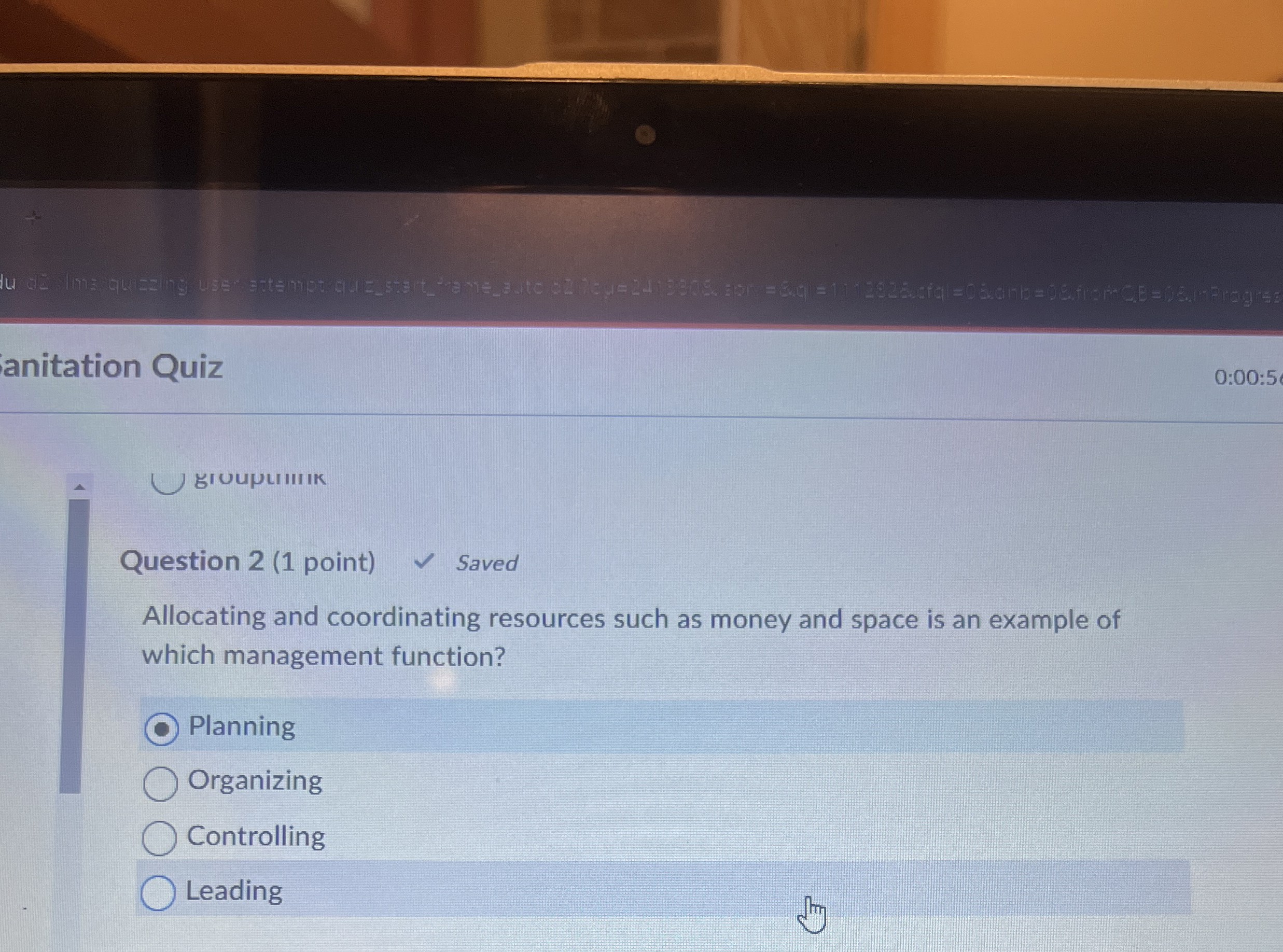  grUUPLIIIIK Question 2(1 point) Allocating and coordinating resources such as money