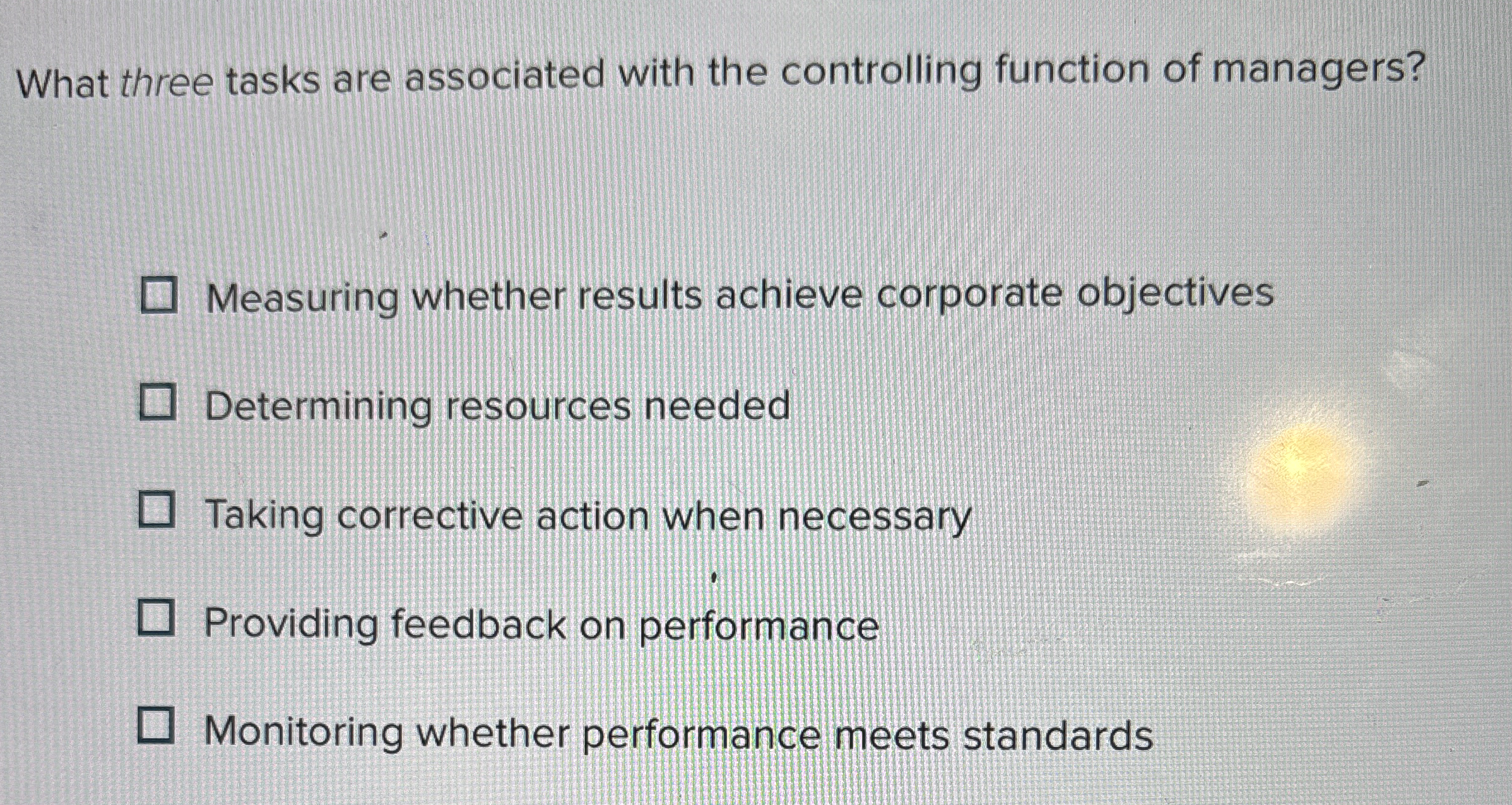  What three tasks are associated with the controlling function of managers?