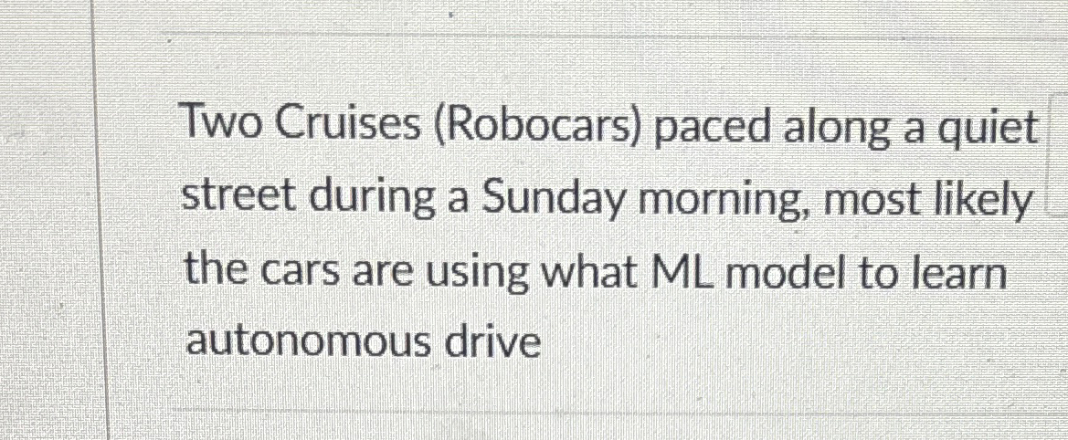  Two Cruises (Robocars) paced along a quiet street during a Sunday