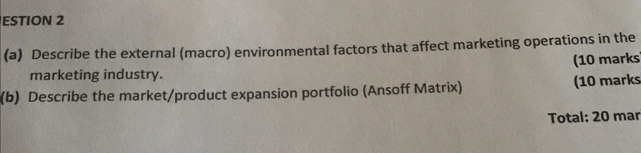  ESTION 2 (a) Describe the external (macro) environmental factors that affect
