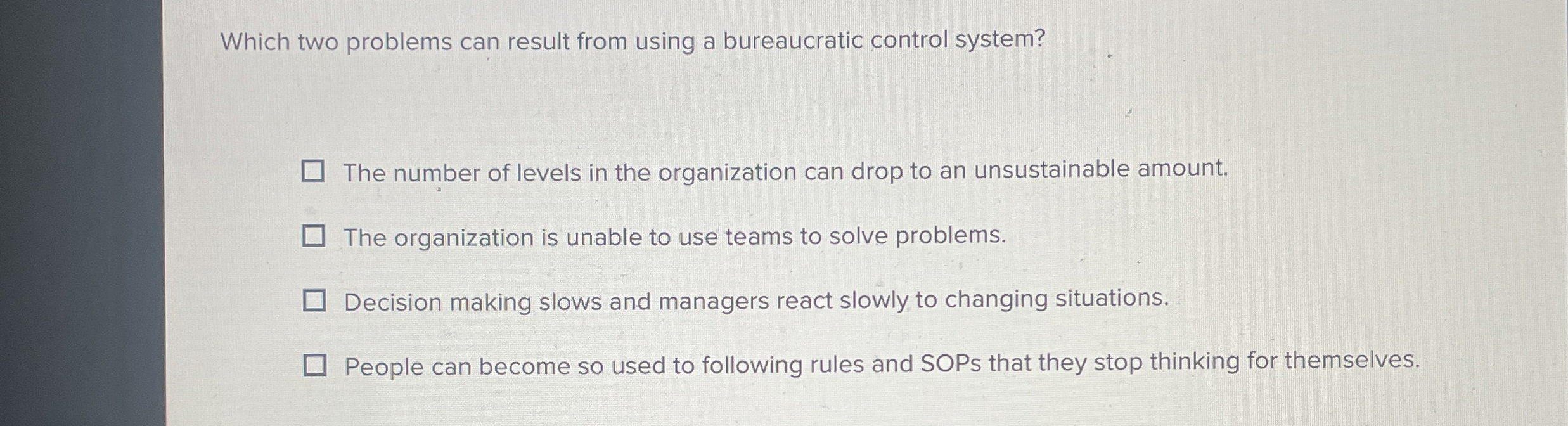  Which two problems can result from using a bureaucratic control system?