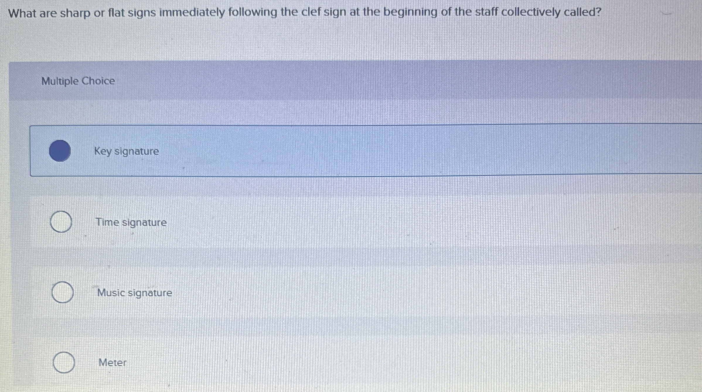  What are sharp or flat signs immediately following the clef sign