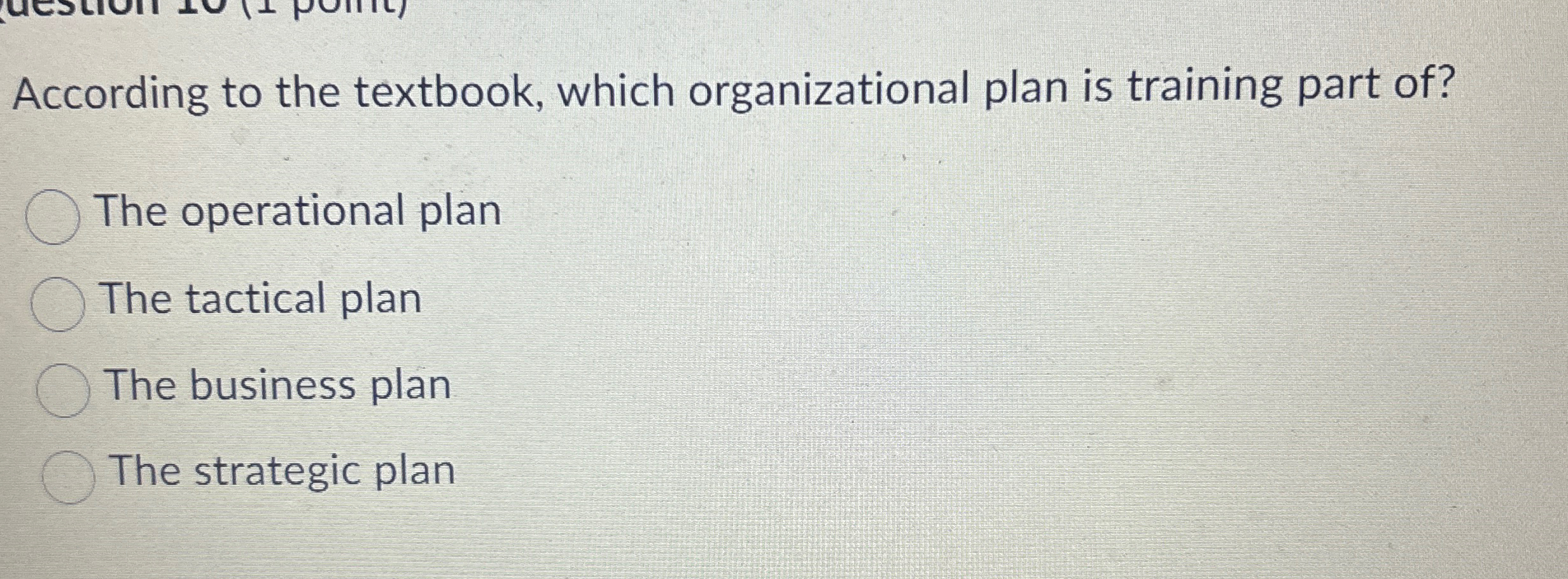  According to the textbook, which organizational plan is training part of?