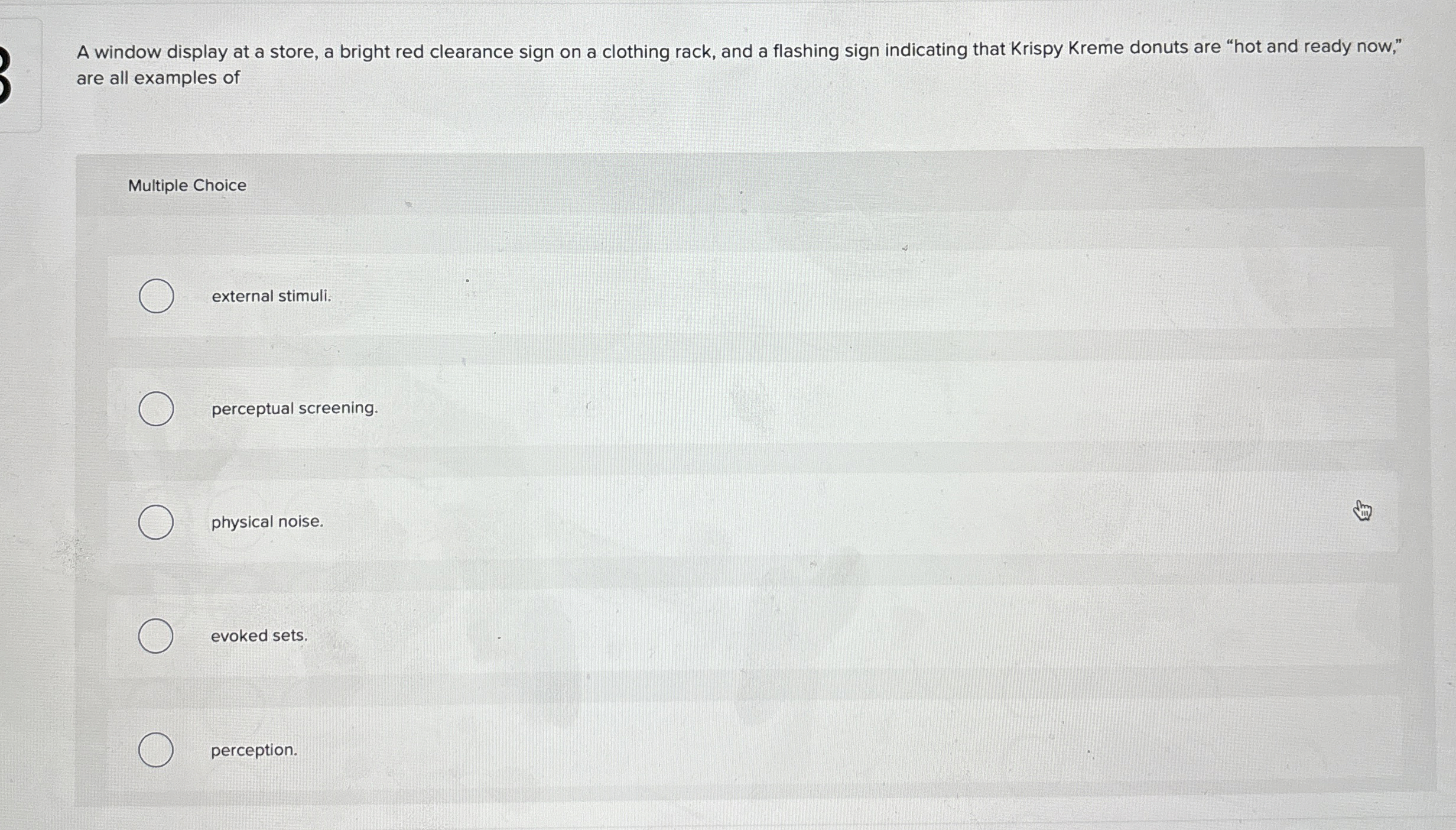  A window display at a store, a bright red clearance sign